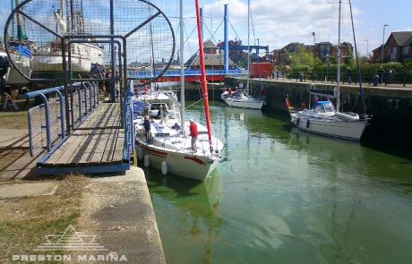 Boats heading into the Ribble from Preston Marina lock chamber